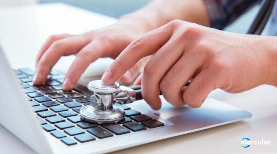 man checking laptop computer health