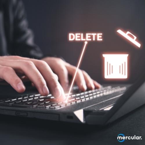 man typing laptop delete