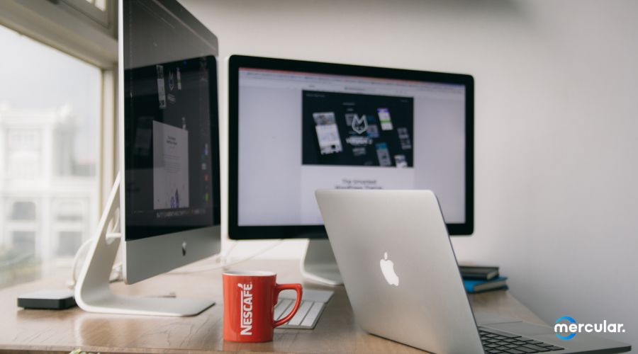 macbook apple logo mac monitor working desk coffee