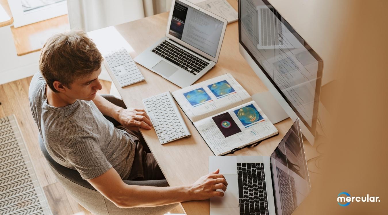 man using computer laptop working top view